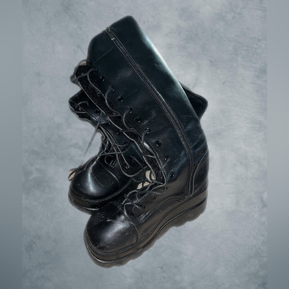Knee length lace up black boots